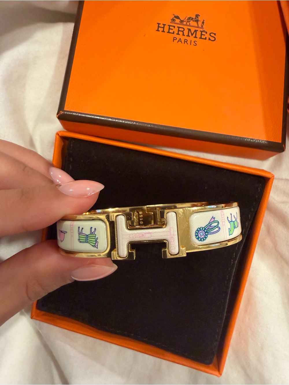 Hermes Gold and Cream Enamel H Clic Clac Bracelet with Pastel Motif